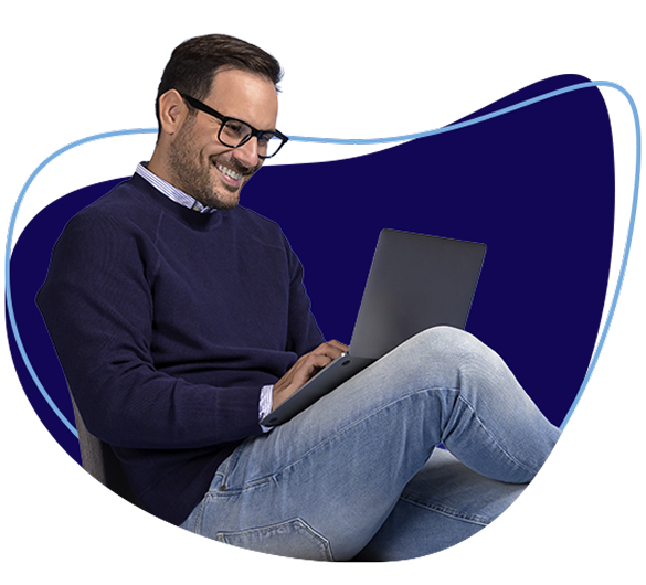 man-with-eyeglasses-sitting-smiling-while-using-laptop Mature woman wearing glasses smiling